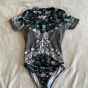 One piece, short sleeve padded swimsuit with zipper